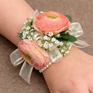 Peach ranunculus corsage