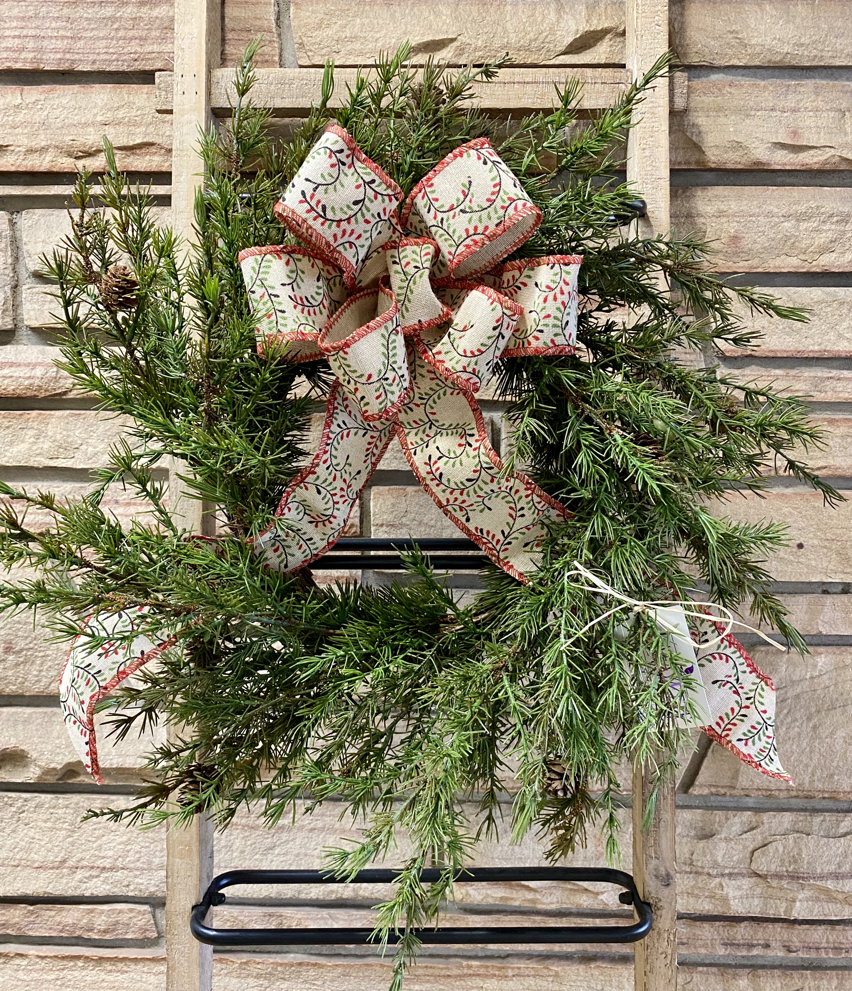 Weatherproof Plastic Cedar Wreath with Mini Pinecones Lafayette Florist